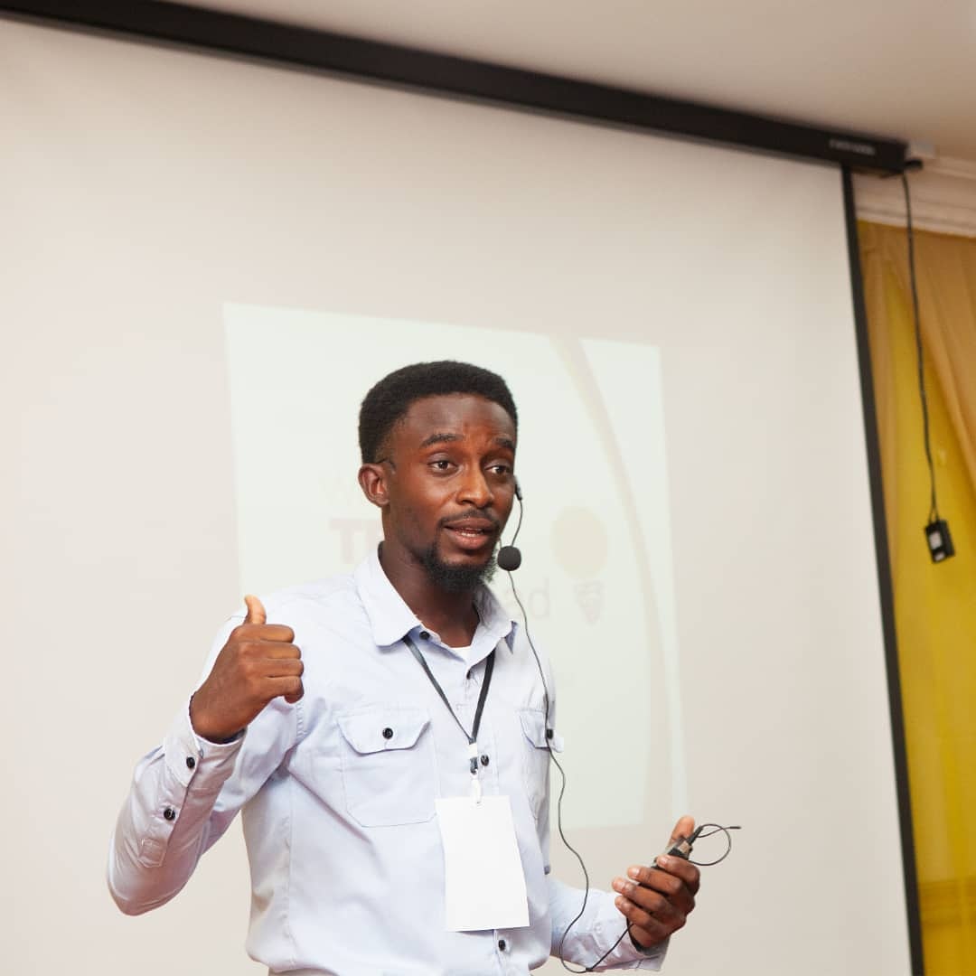Anthony speaking at an event